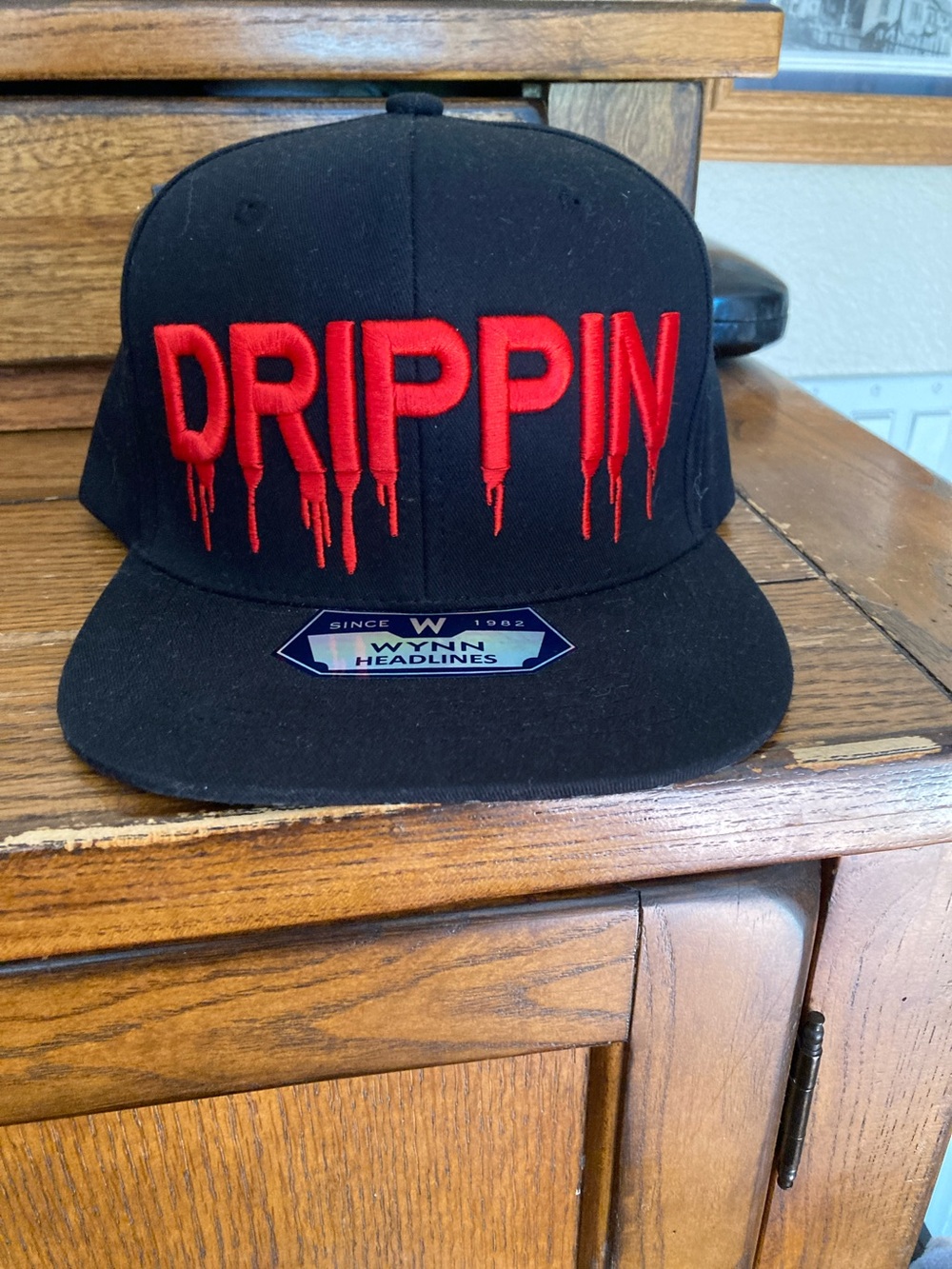 DRIPPIN Embroidered Black Snapback Hat with Red Drip Logo